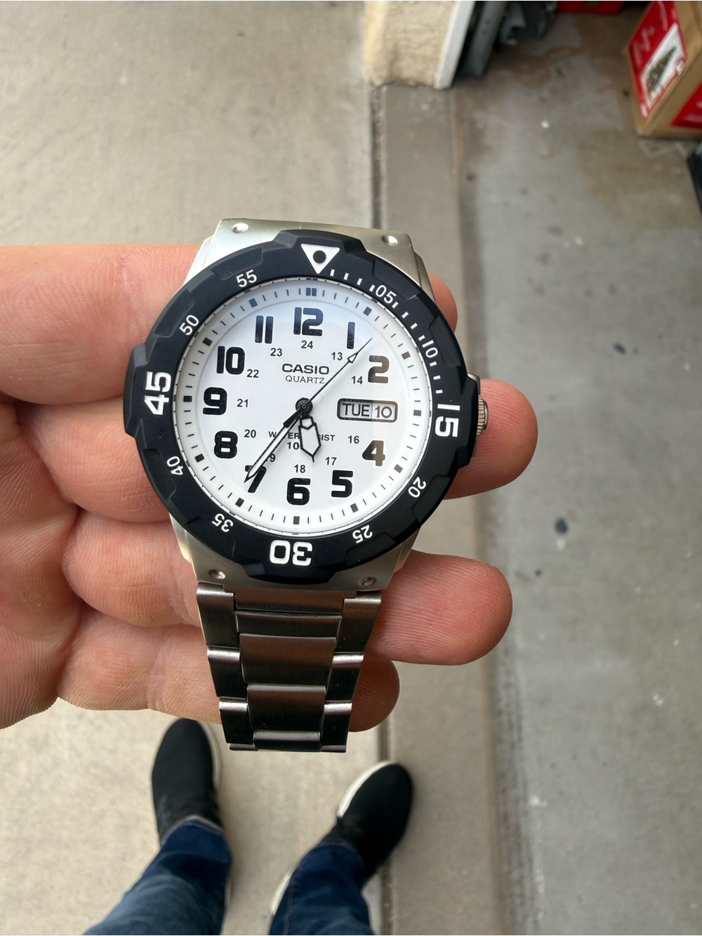 Casio White Dial Watch with Black Bezel and Silver Bracelet